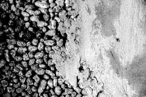 Background of gray expanded clay stones and concrete — Stock Image Background of gray expanded clay stones and concrete Stock Image