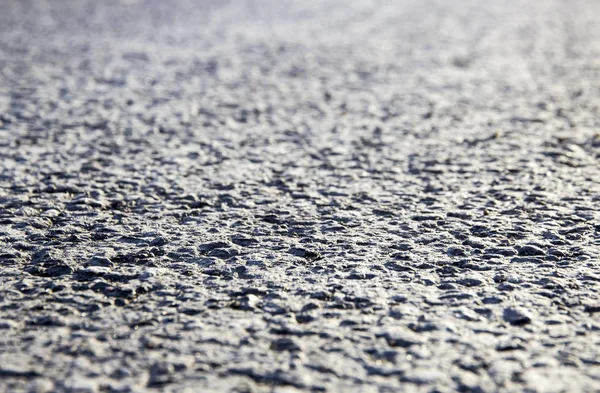 Antecedentes do close-up de asfalto — Fotografia de Stock