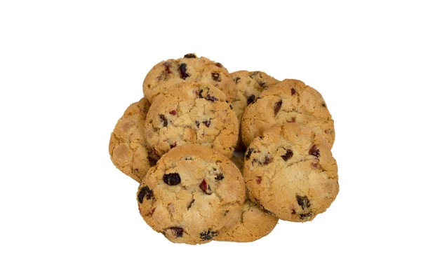 Galletas con pasas en un plato blanco. Vista superior aislada sobre fondo blanco . — Foto de Stock