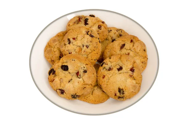 Cookies with raisins on a white plate. Top view — Stock Photo, Image