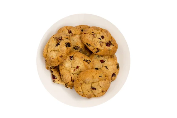 Cookies with raisins on a white plate. Top view — Stock Photo, Image