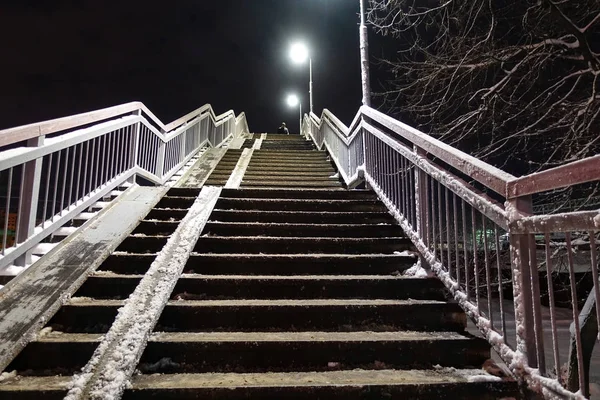 Overpass staircase at night covered in snow. Winter. Russia — Stock Photo, Image