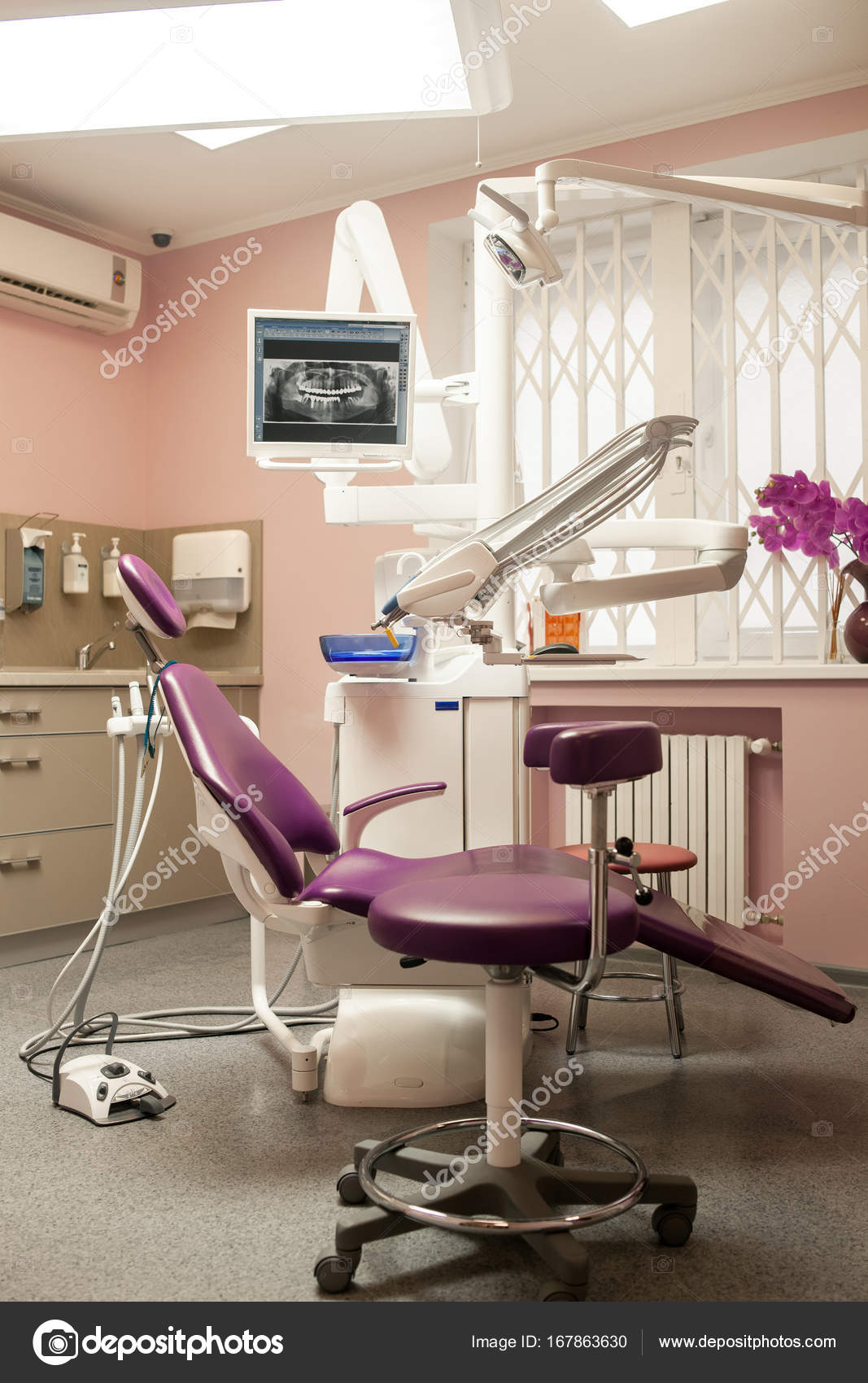 Interior Of Modern Dental Clinic Office With Dental Unit