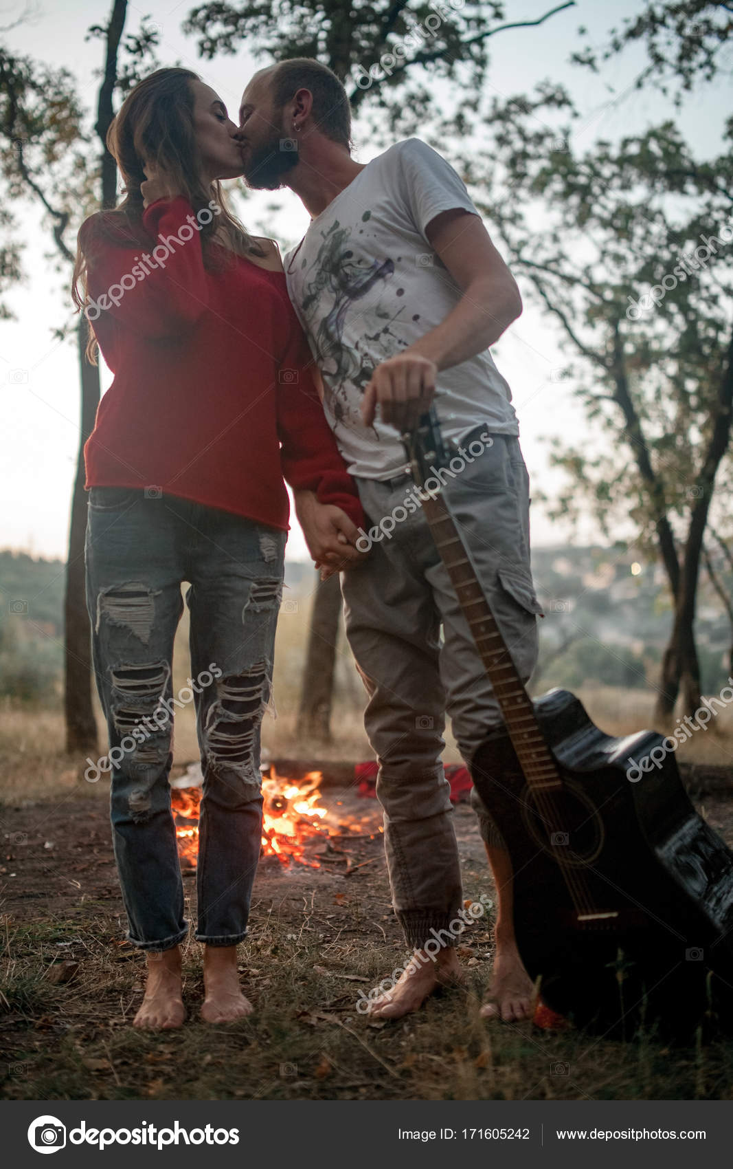 https://st3.depositphotos.com/10880462/17160/i/1600/depositphotos_171605242-stock-photo-enamored-couple-stands-with-guitar.jpg