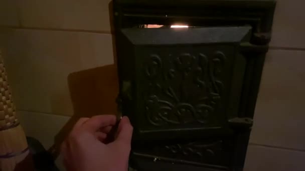 Hand Man Opens Furnace Door Brick Stove Burning Firewood — Stockvideo