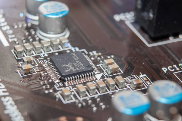 Motherboard repair, chip, closeup, dust, service — Stock Photo, Image