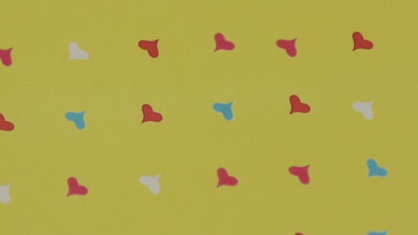 Delikat romantisk bakgrund i färg hjärtan — Stockvideo