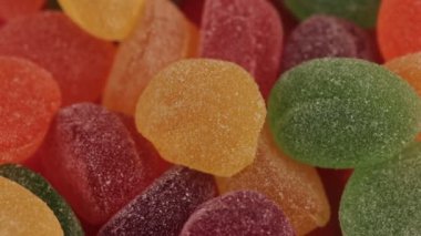 Renkli jöle küpleri arka plan - jöle küpleri ve bir loopable video, atış yakından, canlı renk arka plan geçirerek berry jelly şeker.