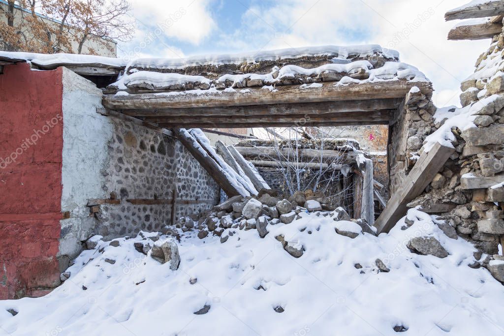 Ruin of old house in Erzurum, Turkey with snow