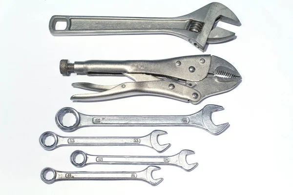 Image of Locking Pliers and Wrench On a white background