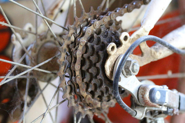 The image of the old gear bike has cobwebs attached.