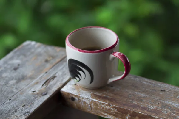 Coffee mug with green background — Stock Photo, Image