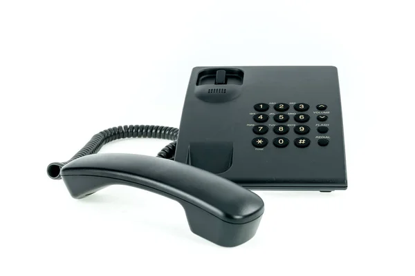 Black office phone with handset near isolated — Stock Photo, Image