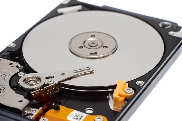 Close up inside of 2.5" computer hard disk drive HDD isolated Stock Image