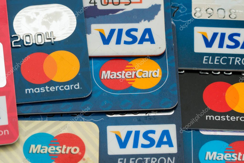 Sarajevo, Bosnia and Herzegovina - March 04, 2018: closeup pile of credit cards, Visa and MasterCard, credit, debit and electronic