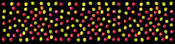 Bright colored sweet candy isolated on black background — Stock Photo, Image