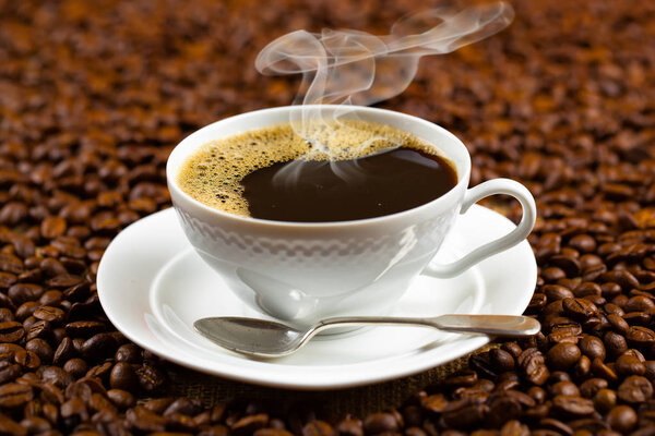 Black coffee on the old background