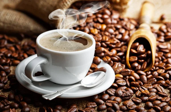 Black coffee on the old background — Stock Photo, Image