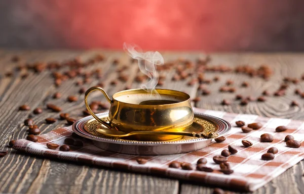 Black coffee on the old background — Stock Photo, Image