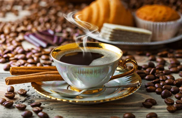 Black coffee on the old background — Stock Photo, Image