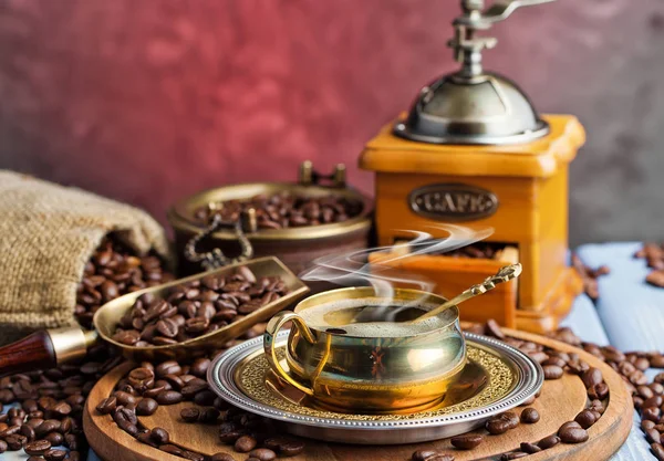 Black coffee on the old background — Stock Photo, Image