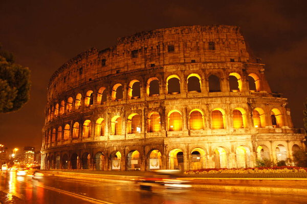 Rome in the rain night Colosseum and lights