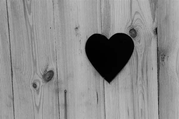 Corazón en textura de madera gris — Foto de Stock