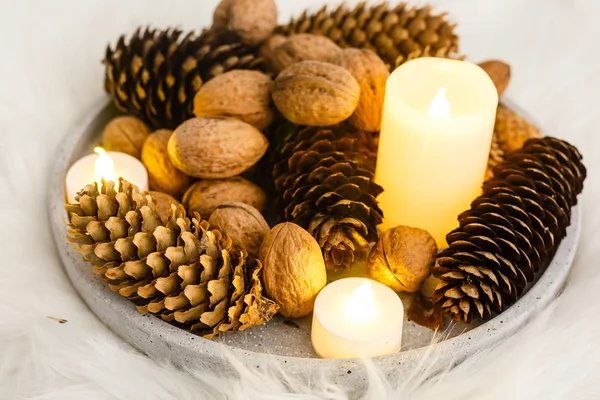 Christmas table setting, christmas decor, candle, cones