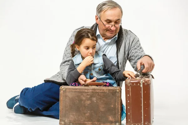 Granddaughter Grandfather Sitting Brown Old Suitcases — Stock Photo, Image