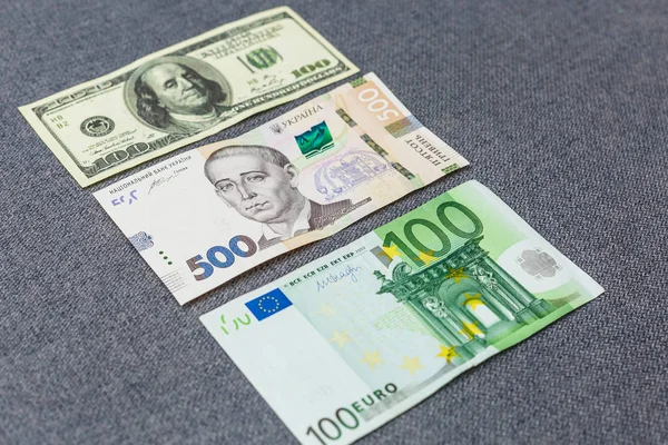 Billetes Hryvnia Dólares Euro Primer Plano Yacen Sobre Mesa Textura — Foto de Stock