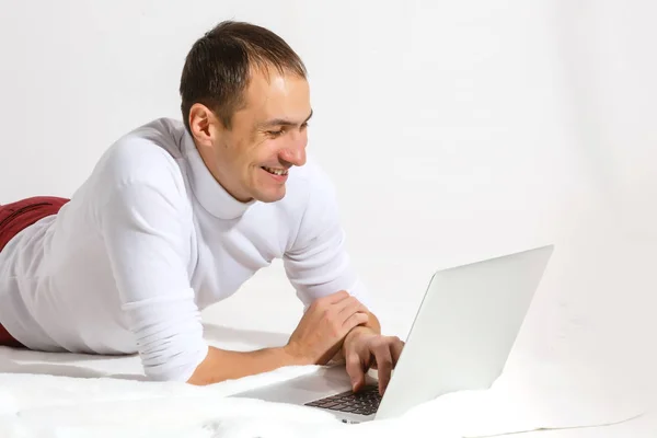 Surfing Web Home Cheerful Young Man Lying Floor Laptop Isolated — Stock Photo, Image