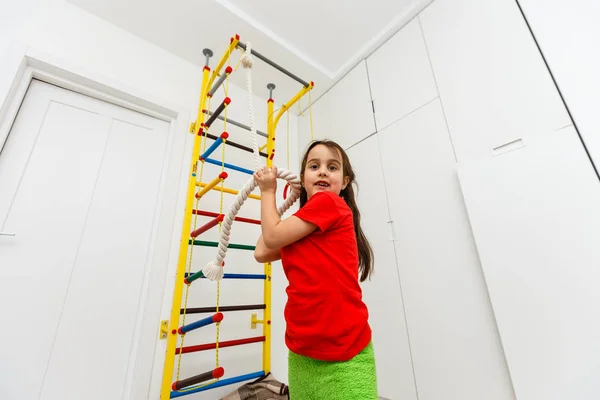 Little Girl Climbing Ladder — Stock Photo, Image