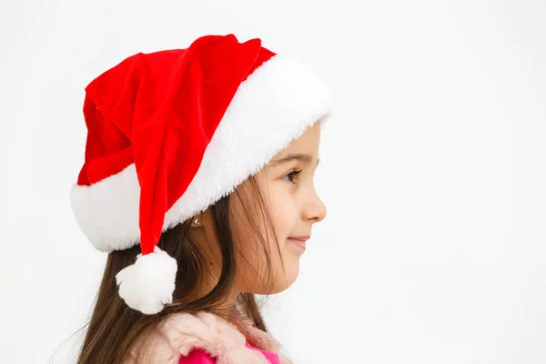 Портрет Красивої Різдвяної Дівчини Капелюсі Санти Посміхаючись Ізольовано Білому Тлі — стокове фото