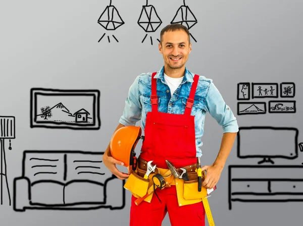 Trabalhador Masculino Com Capacete Reparador Faz Tudo Comerciante Sobre Plano — Fotografia de Stock