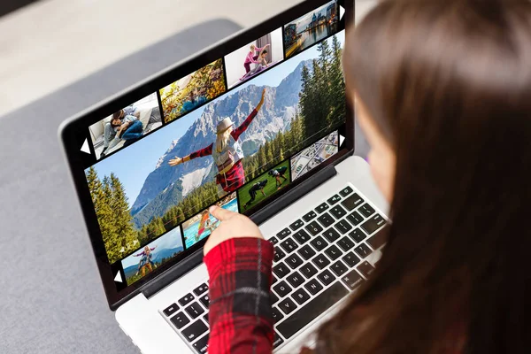 Home, leisure, technology and internet concept - little student girl with laptop computer at home — Stock Photo, Image