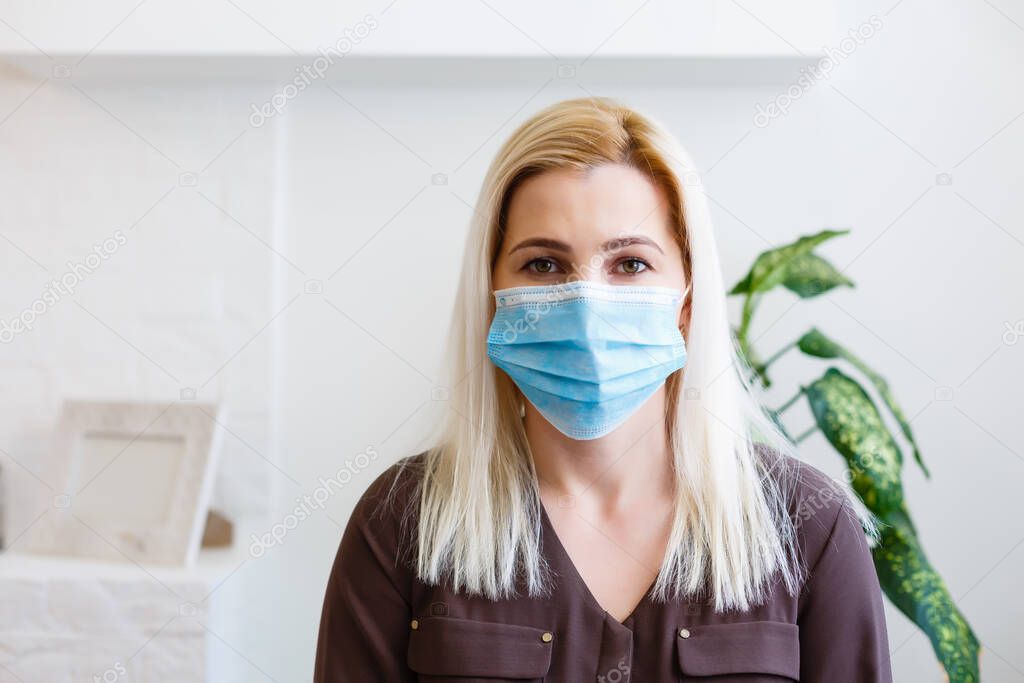 woman wear with protective face mask at home