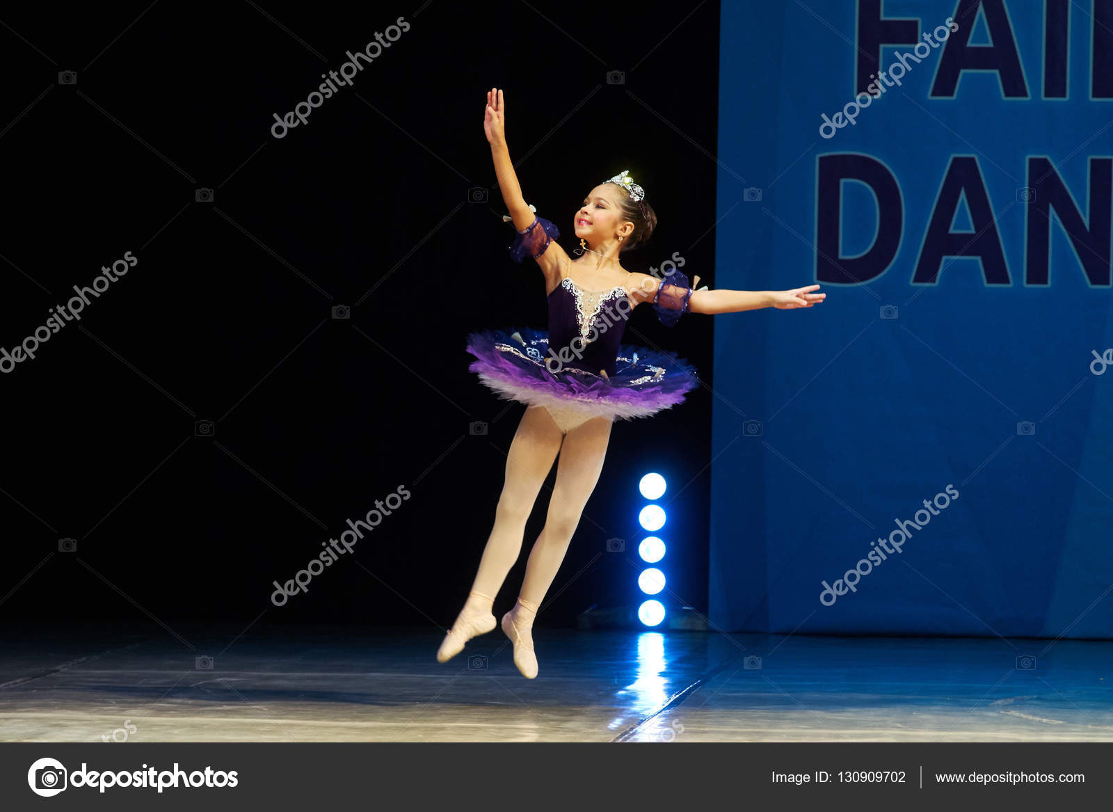Young Ballerina girl dancing on stage Stock Editorial Photo © CarMan