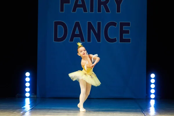 Young Ballerina girl dancing on stage — Stock Photo, Image