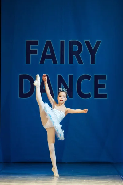 Young Ballerina girl dancing on stage — Stock Photo, Image