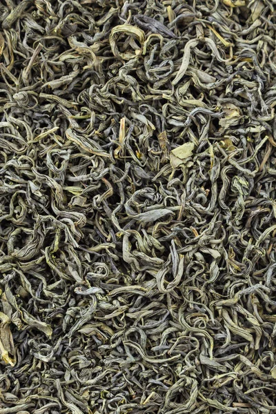 Çay otlar doku. Yeşil çay arka plan. Organik kurutulmuş yeşil çay yaprakları.