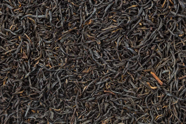 Çay otlar doku. Siyah çay arka plan. Organik kurutulmuş siyah çay yaprakları.