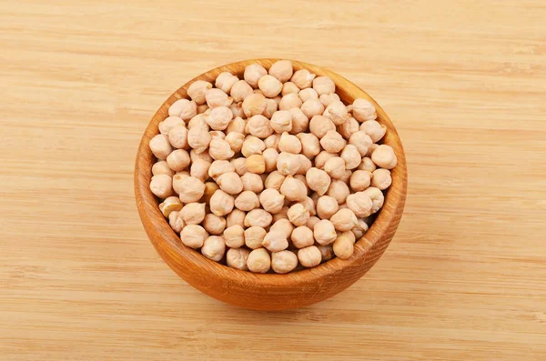 Chickpea in wooden bowl — Stock Photo, Image