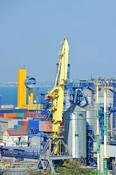 Cargo crane and grain dryer — Stock Photo, Image