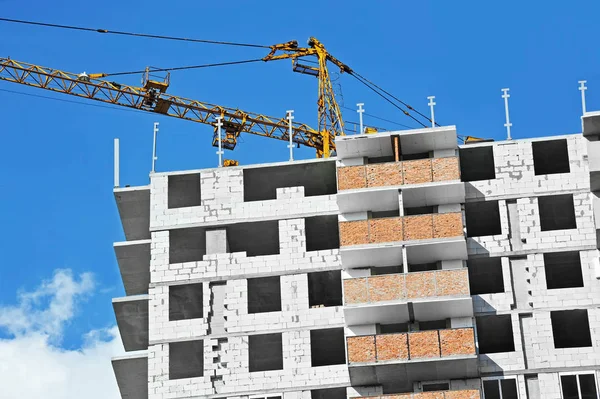 Crane and highrise construction site — Stock Photo, Image