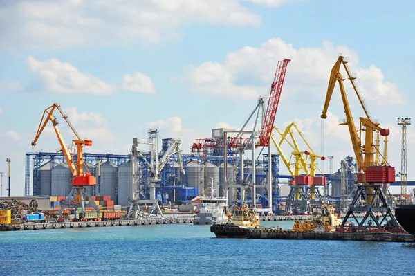 Tugboat and port cargo crane — Stock Photo, Image