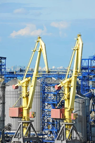 Cargo crane and grain dryer — Stock Photo, Image