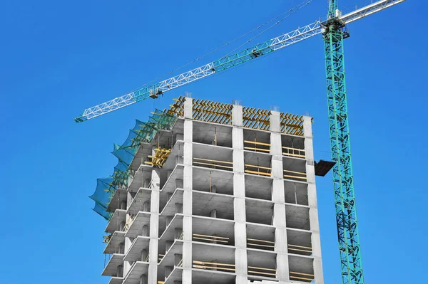 Crane and highrise construction site — Stock Photo, Image