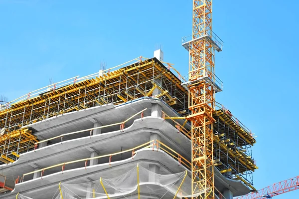 Crane and highrise construction site — Stock Photo, Image