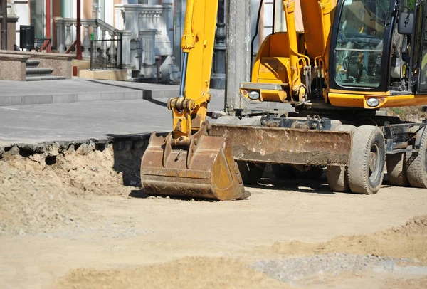 Excavating machine on road site — Stock Photo, Image