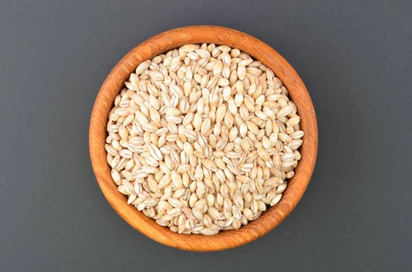 Barley grits in bowl — Stock Photo, Image